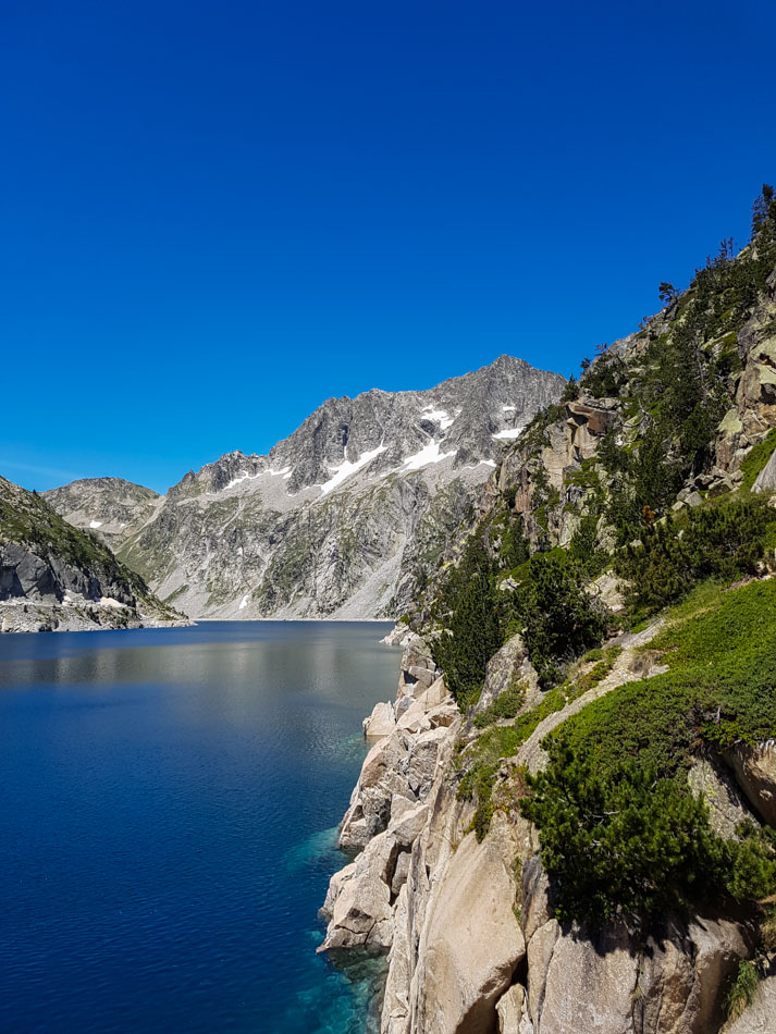 Lac de Cap de Long in the Pyrenees under perfect blue skies