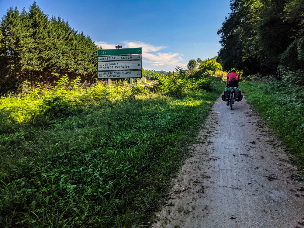 Cycling on the shared use VOie Verte from Saint-Girons to Foix. THe trail is crushed dirt and in good condition.