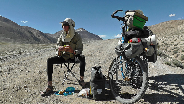 Mark Gresser - taking a lunch break on the side of the road in Tajikistan