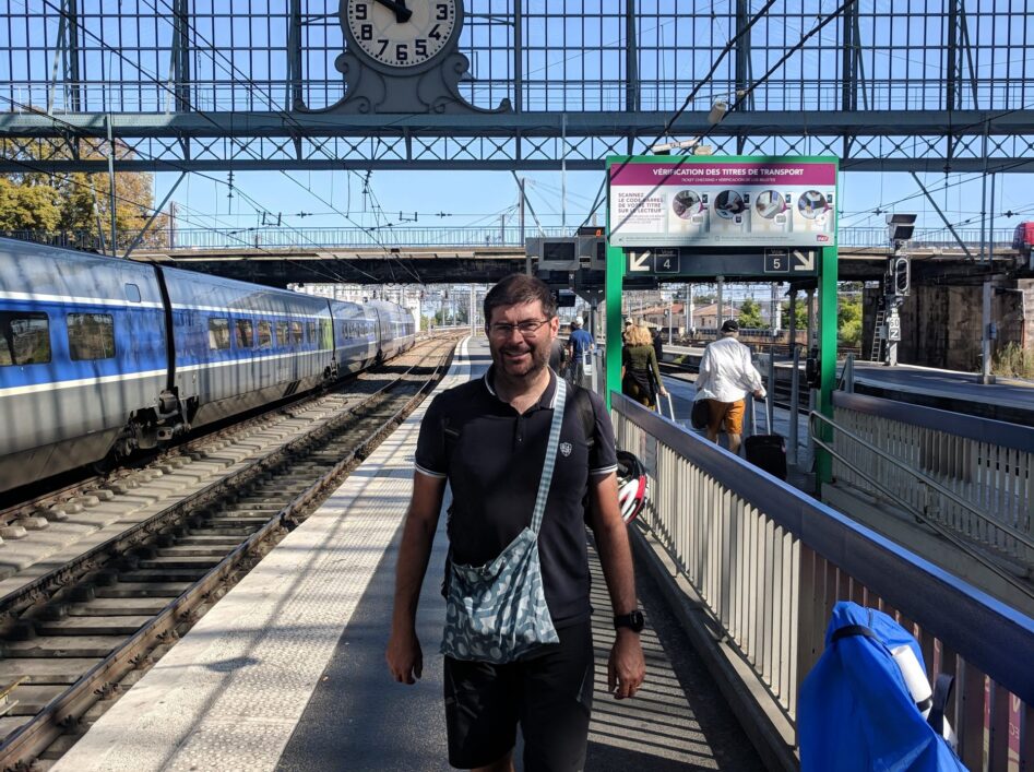 Man with bike packed for travel on the train at bordeaux tgv station