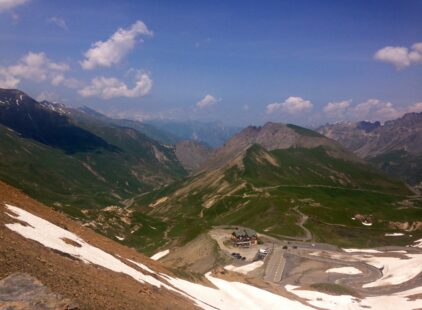 View from the summit looking at the road of the Col du Galibier a famous climb of the French Alps