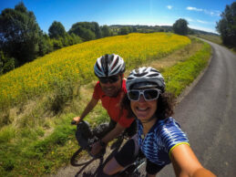 Cycling through sunflower fields in France