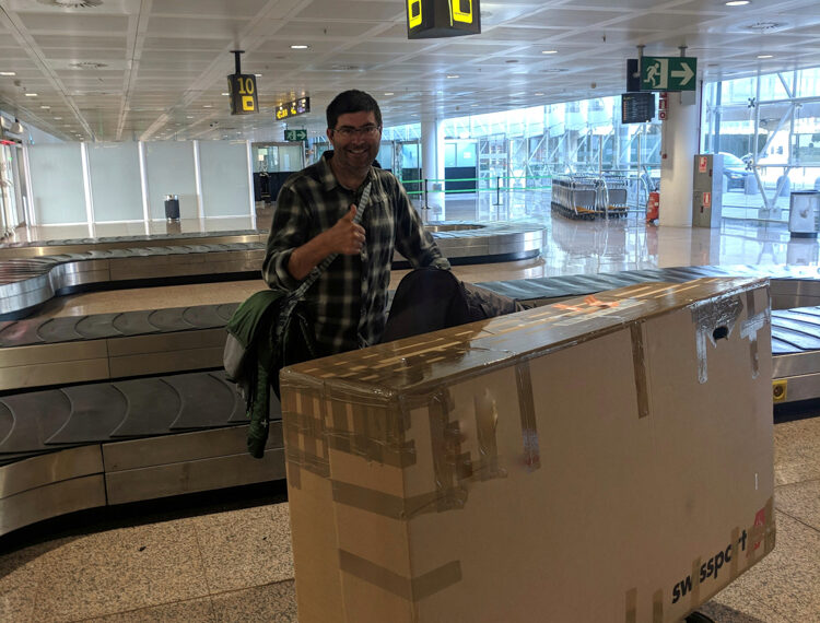 Collecting bikes in cardboard boxes at the airport